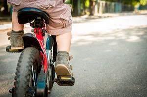 Kid riding a bicycle