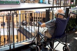 Old man sitting in a wheel chair